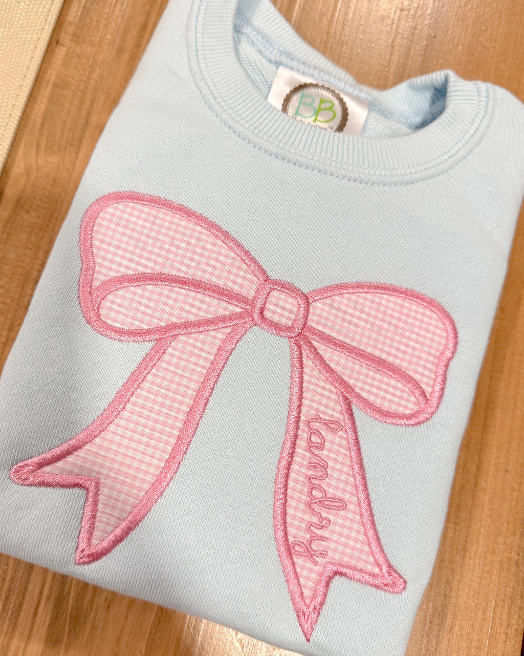 Pink Gingham Bow on Blue Sweatshirt